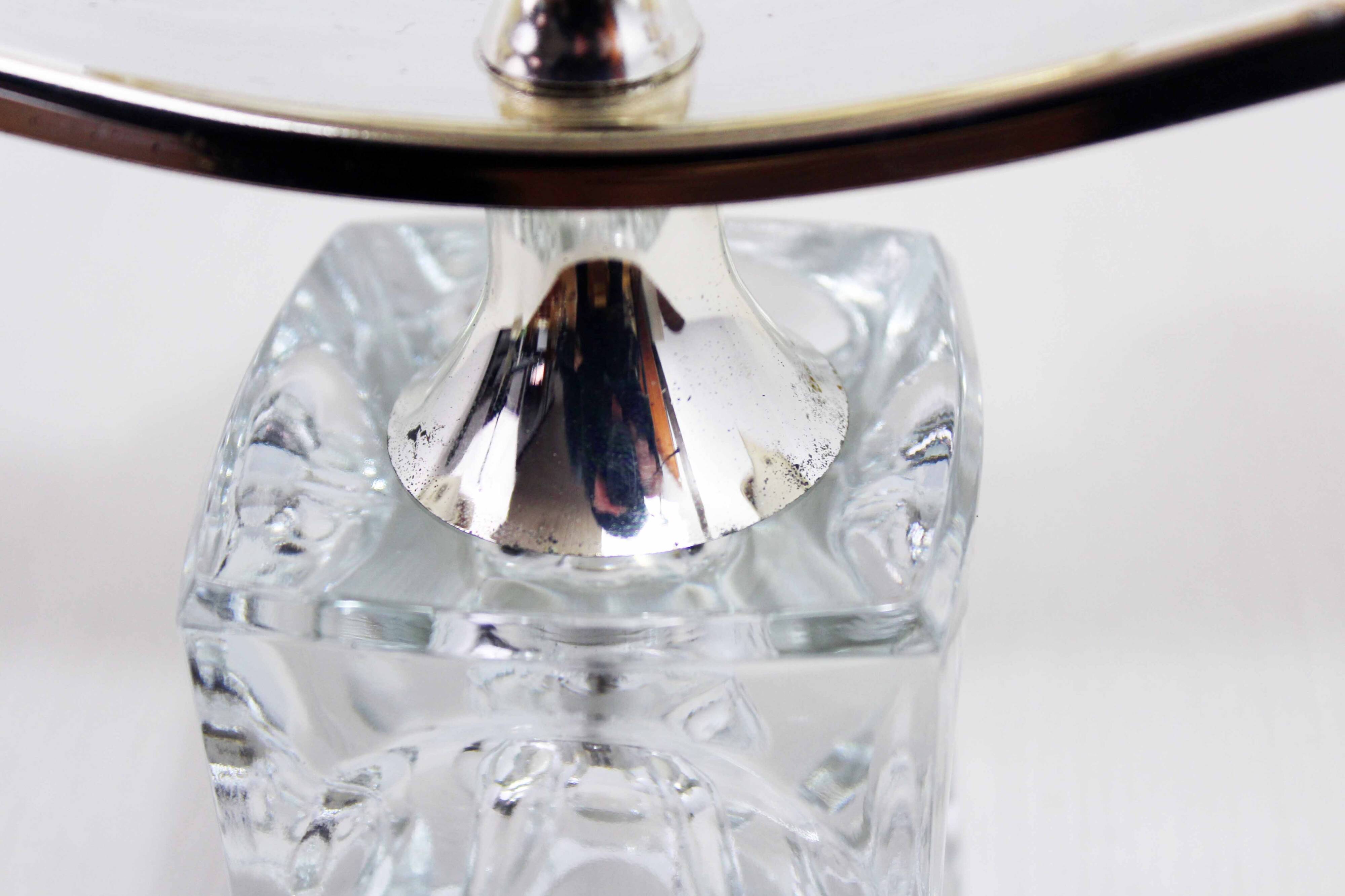 Glass and silver-plated metal candle holder
