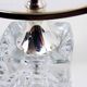 Glass and silver-plated metal candle holder