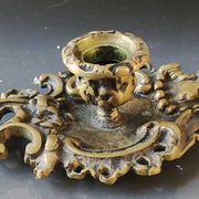 Antique Baroque/Rocaille style hand candle holder. In bronze with an old gold patina.