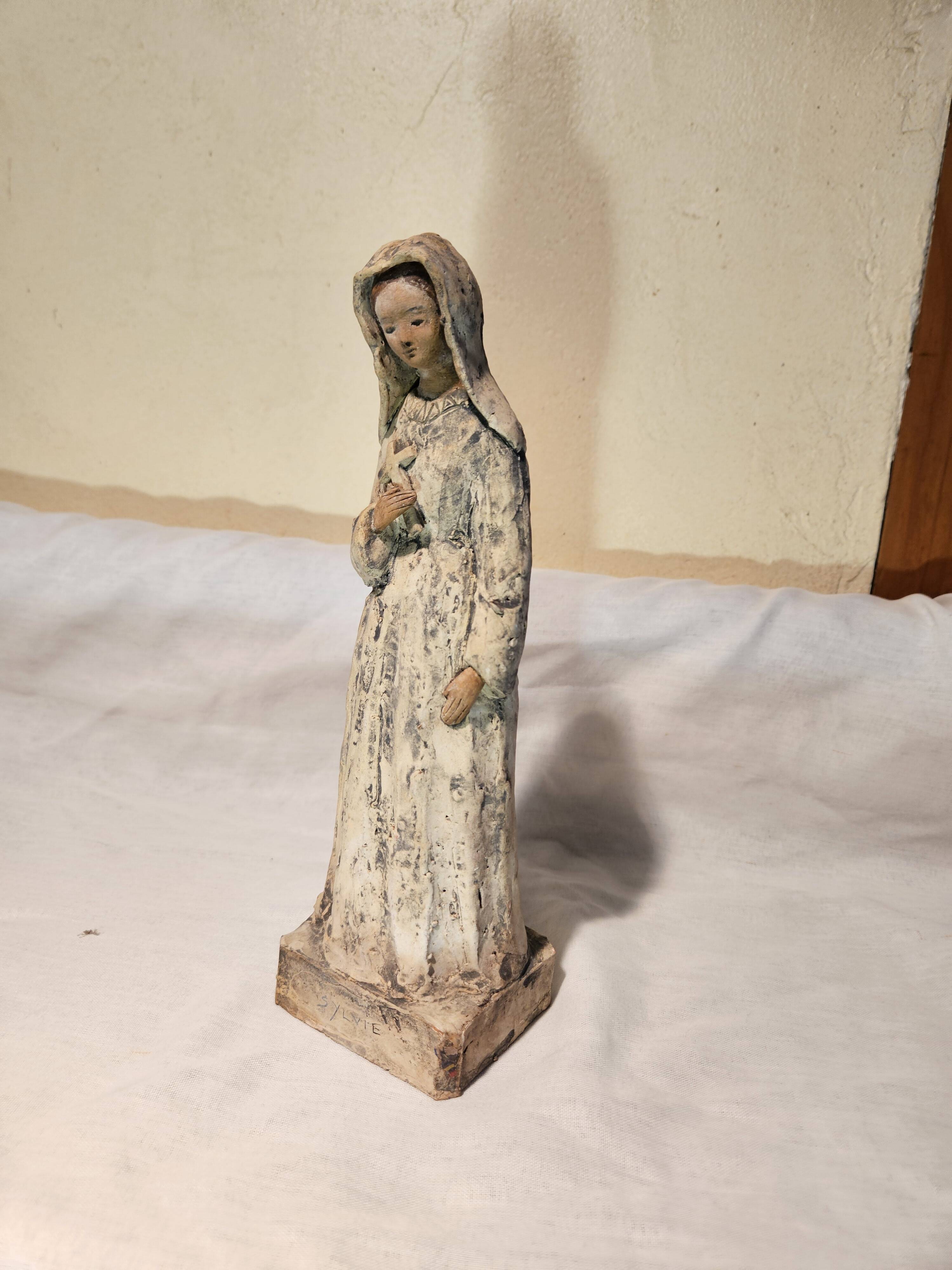 Painted terracotta holy virgin statue