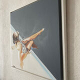 Seated woman painting