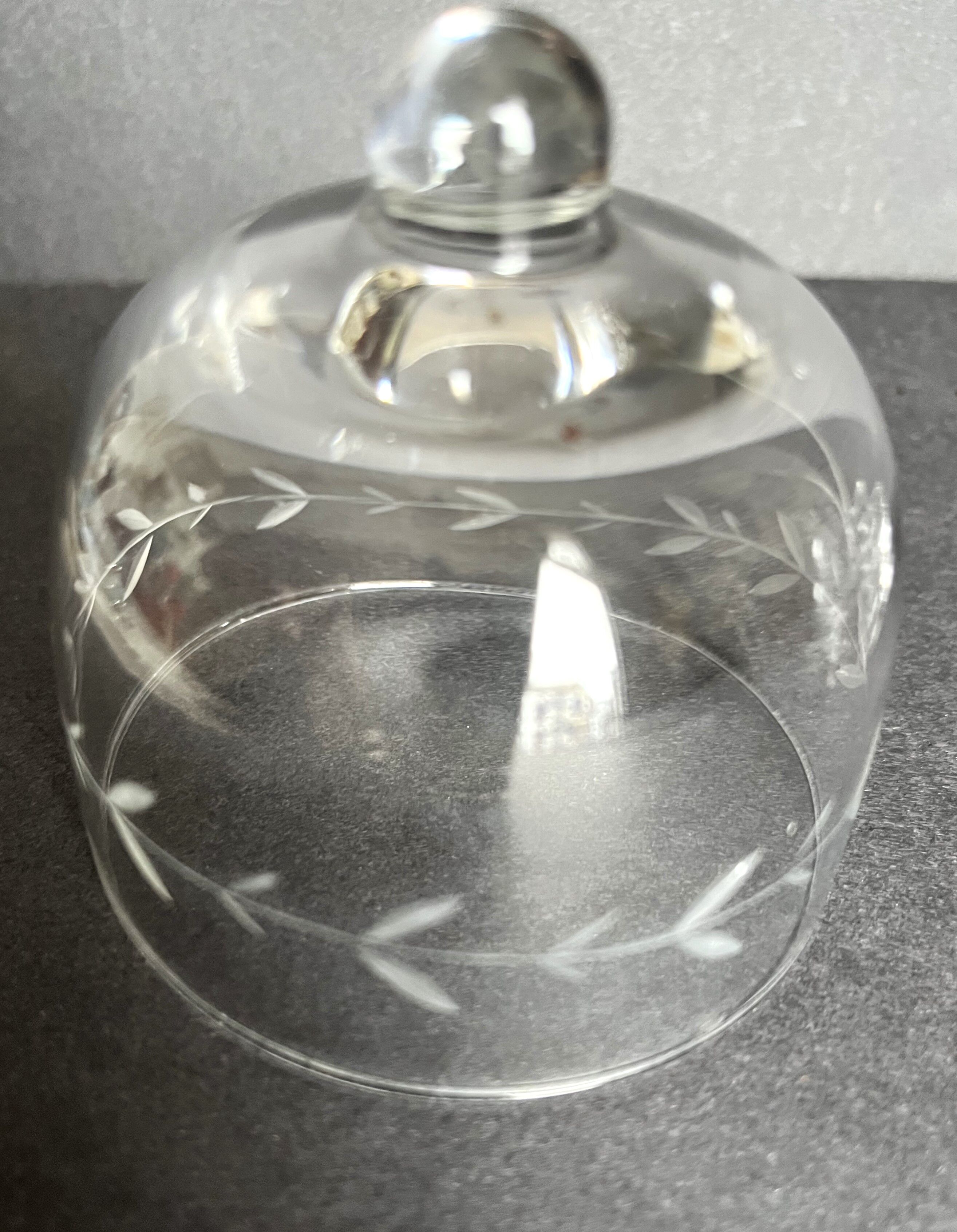 Pair of engraved glass butter dishes
