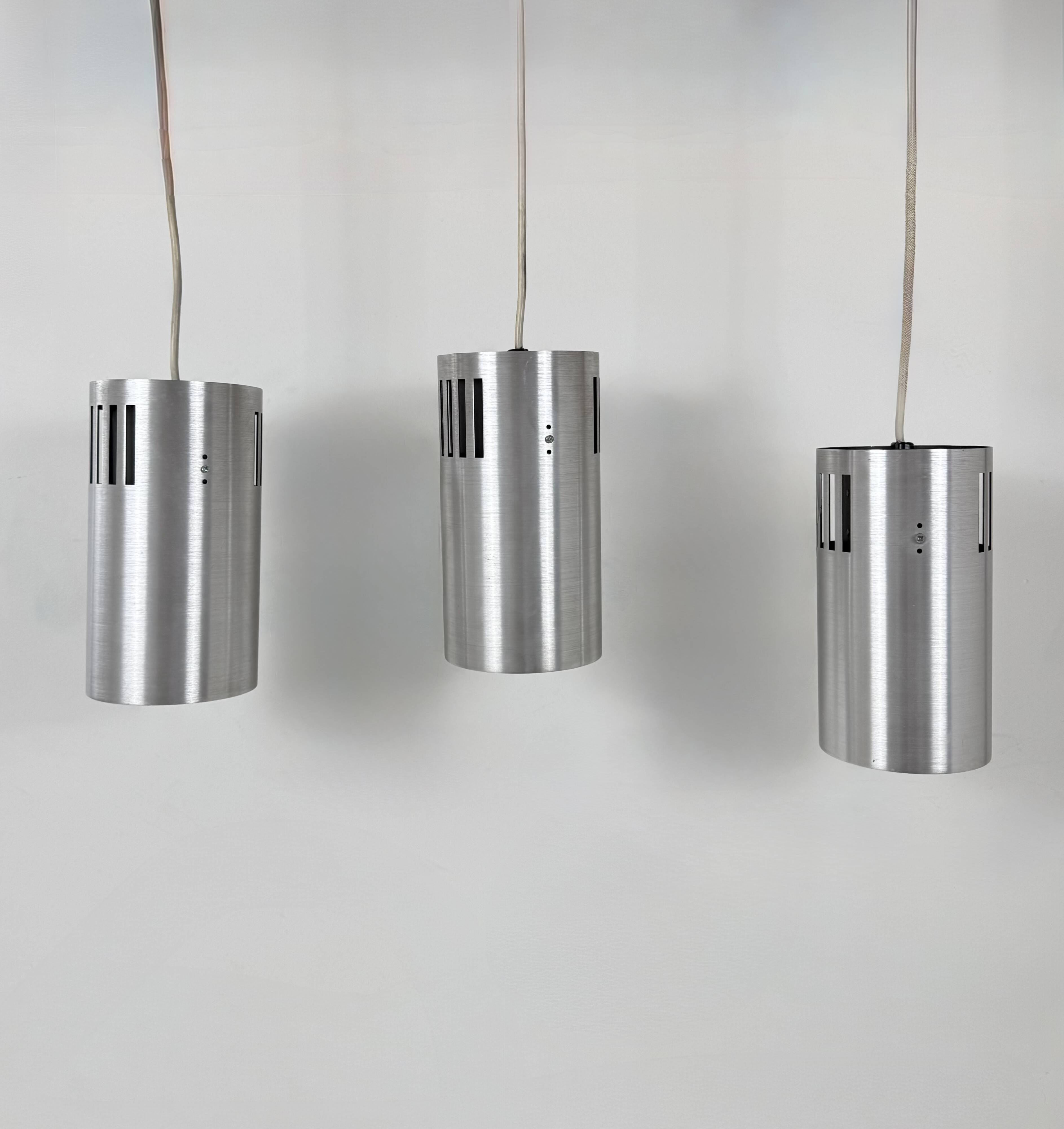 Set of 3 vintage brushed metal pendants, France, 1970.