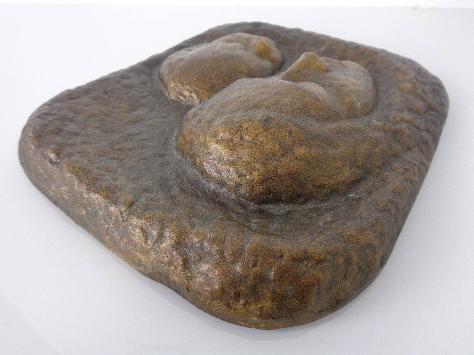 German bronze relief of mother with baby, 1940s.