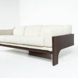 Oriolo canapé by Claudio Salocchi for Sormani in wood and white fabric.