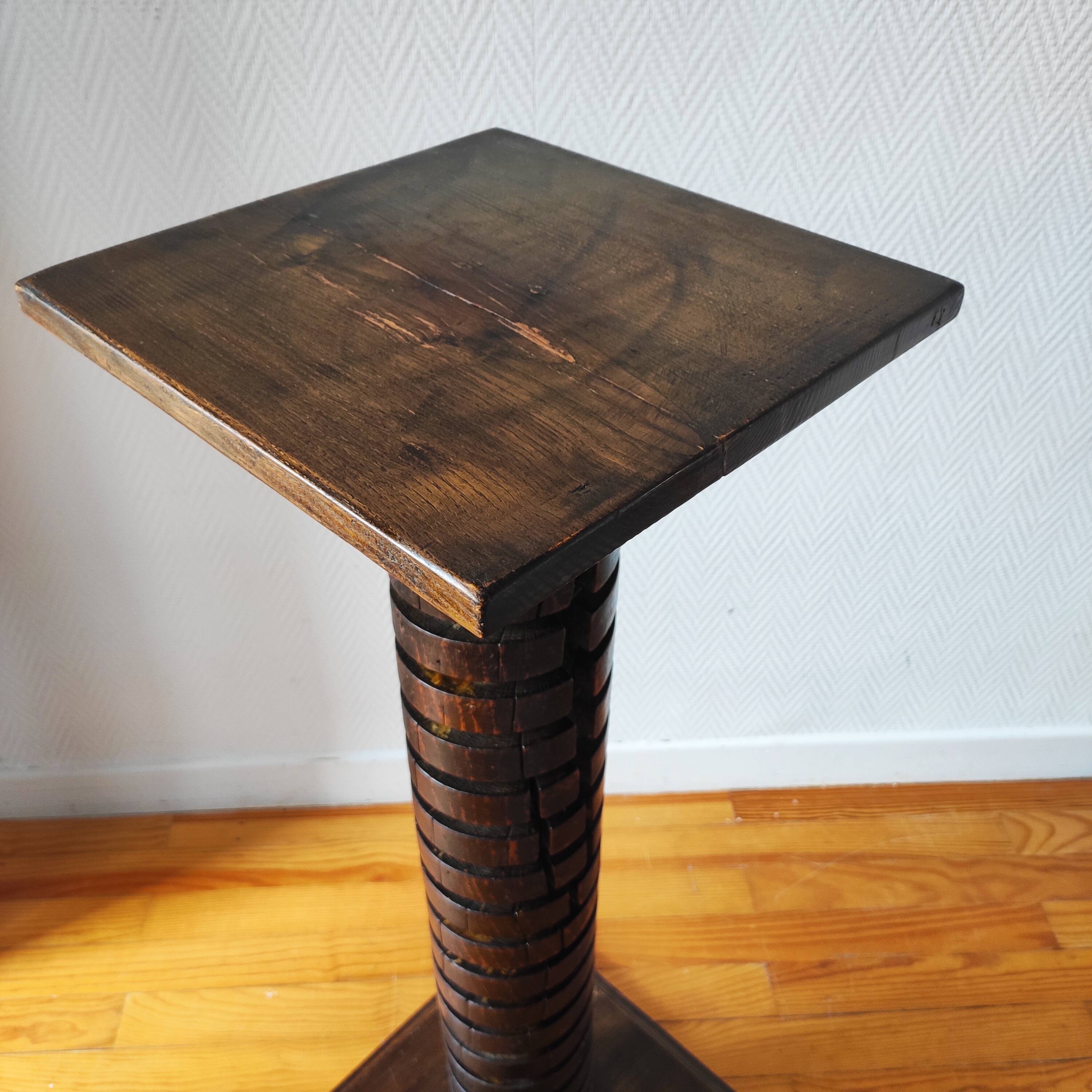 Brutalist column – old Burgundy press screw