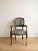 Louis XV Voltaire armchair in wood and green fabric