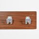 Wall coat rack and lights by Pierre Guariche for La Plagne, around 1968.