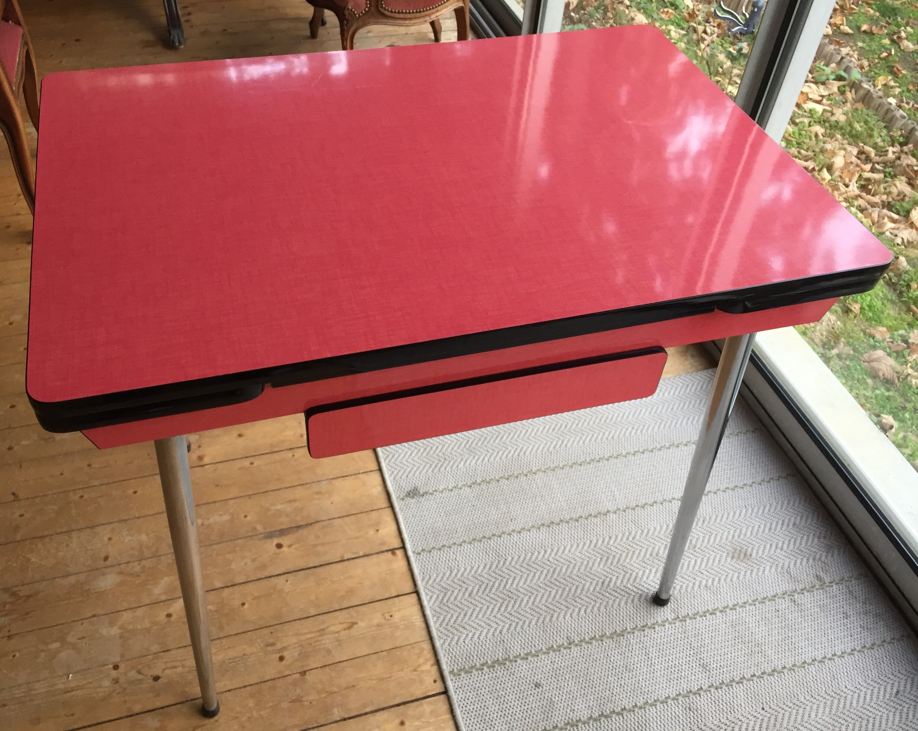 Table set and 2 vintage vintage pale red formica chairs