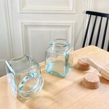 Pair of square jars in tinted glass and corks