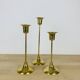 3 Scandinavian style gold-plated brass candle holders