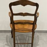 Provencal style straw armchair sometimes called marsh armchair