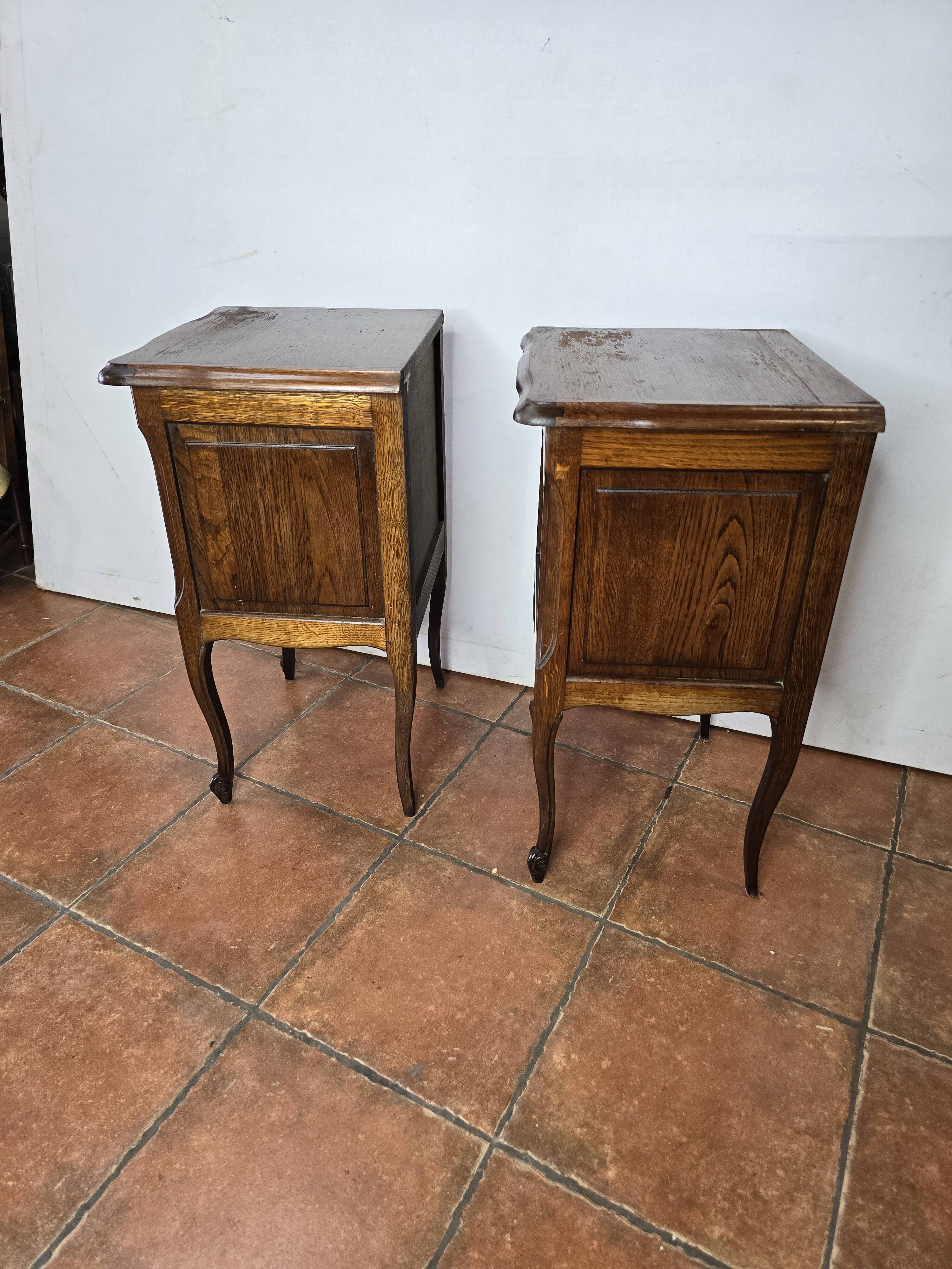 Pair of Louis XV style oak bedside tables