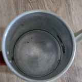 Old enamelled coffee maker in red handle aluminum