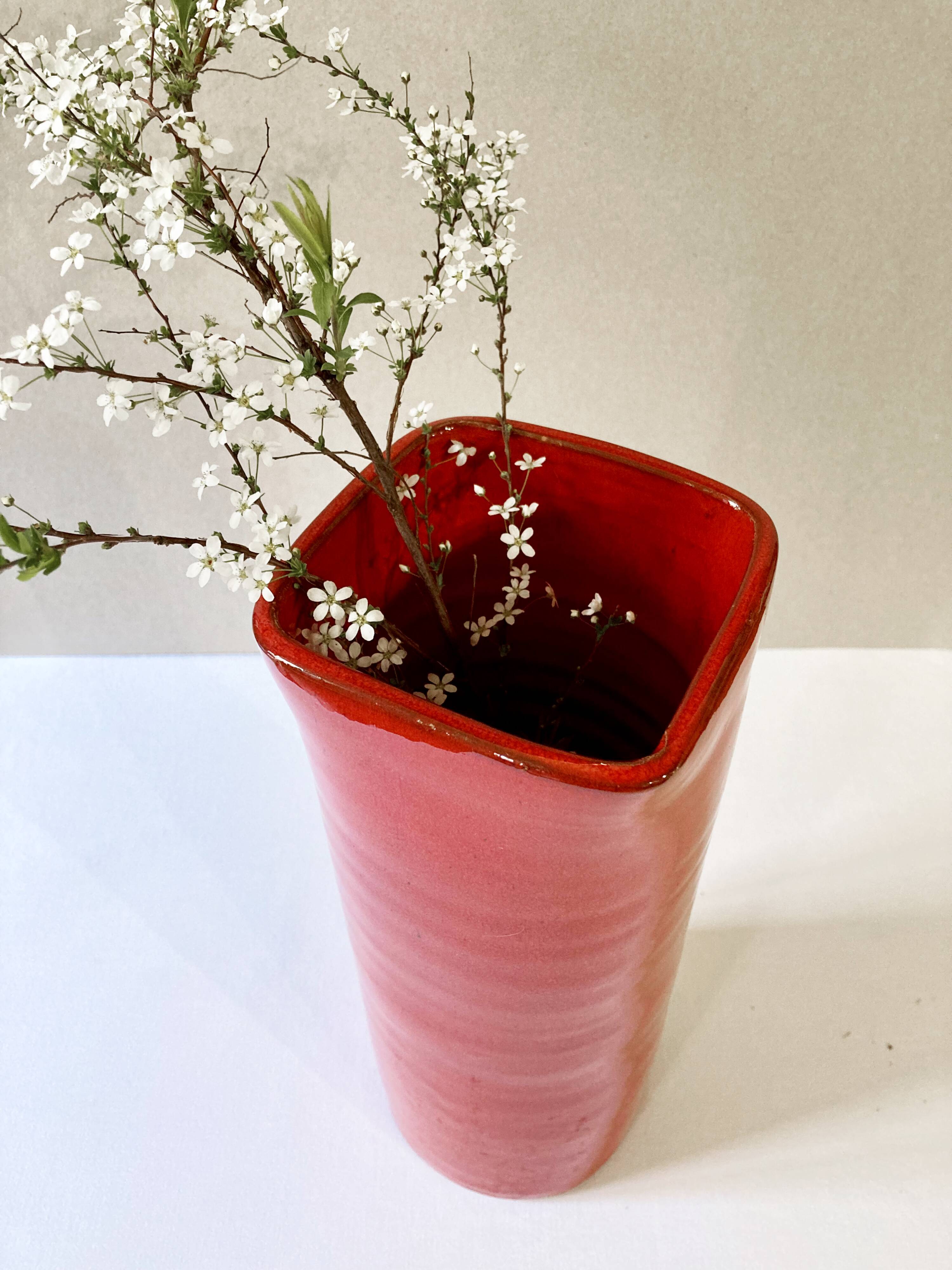 Large red glazed ceramic vase