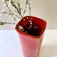 Large red glazed ceramic vase