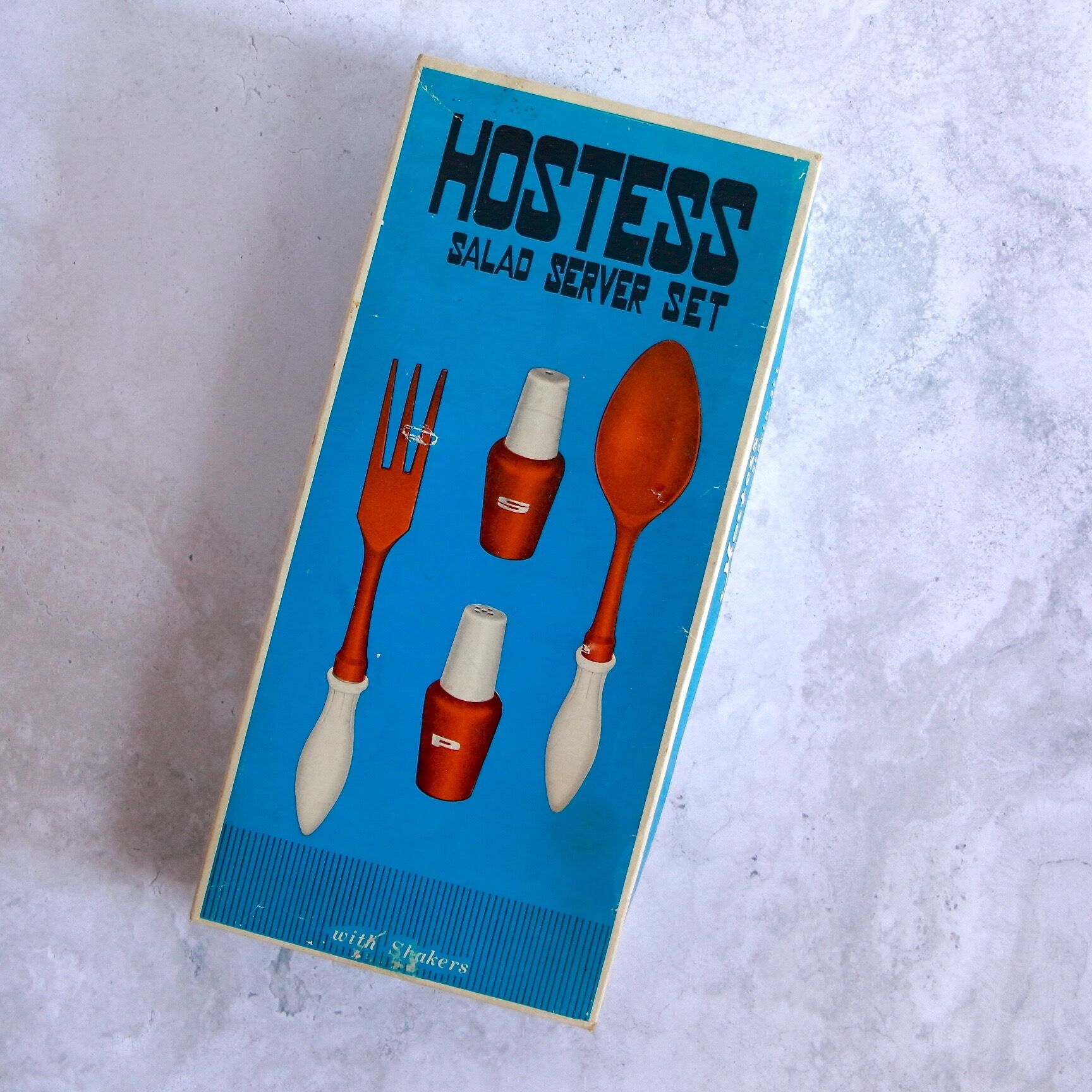 Set of wooden and ceramic salad cutlery