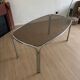 Smoked glass dining table from the 1970s.
