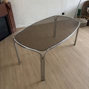 Smoked glass dining table from the 70s.