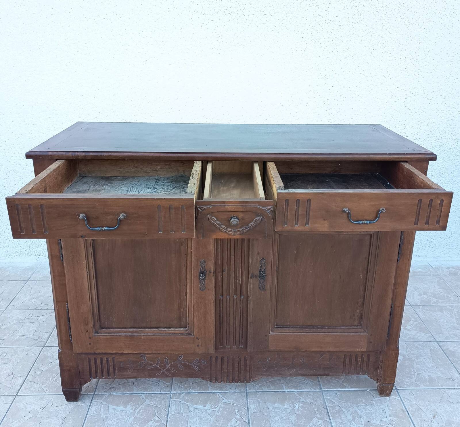Louis XVI walnut buffet from the 19th century.