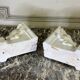 Pair of white statuary marble consoles, with faun heads