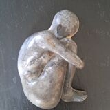 Sculpture of a woman, curiosity