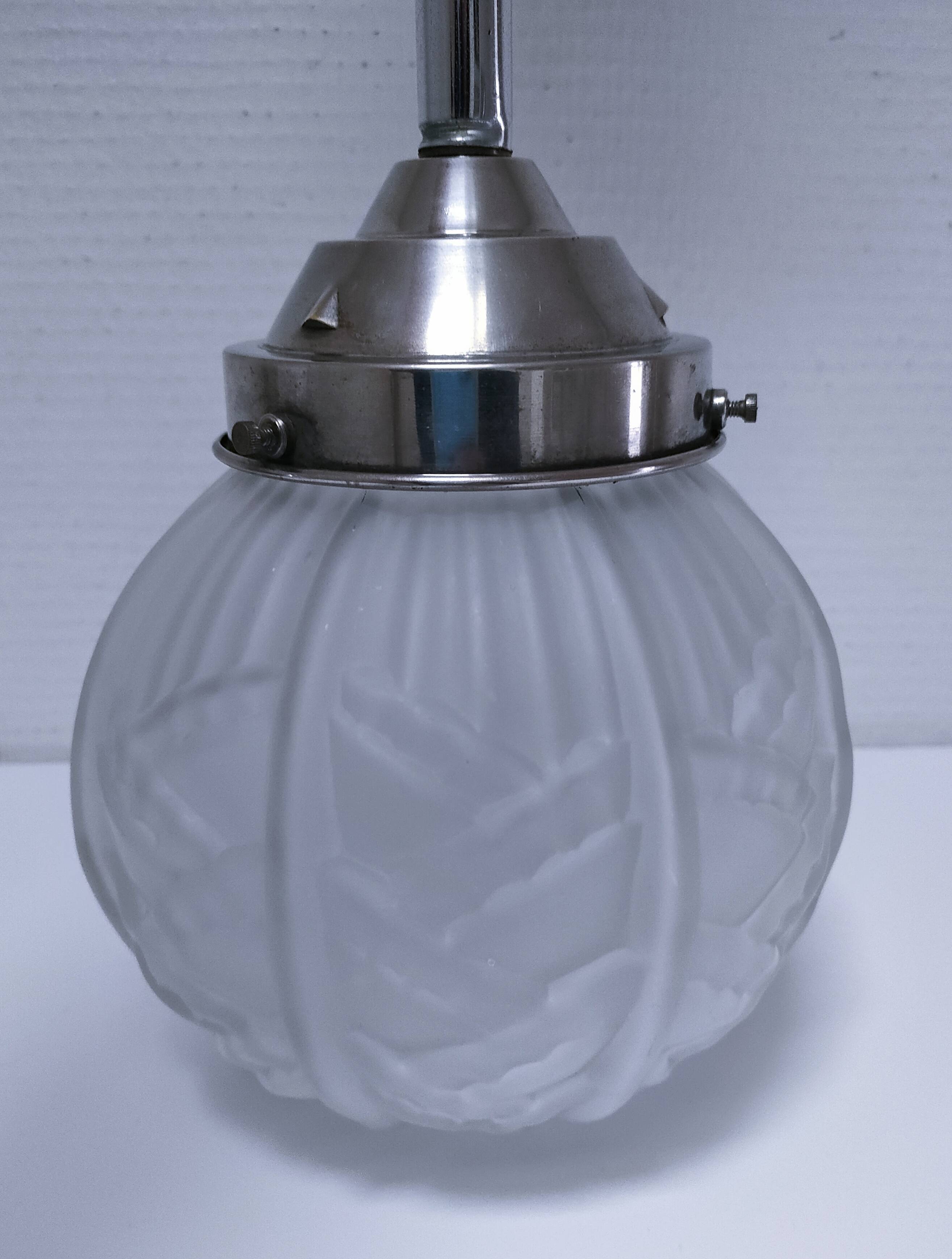 art deco pendant light with molded glass and chrome-plated metal frame