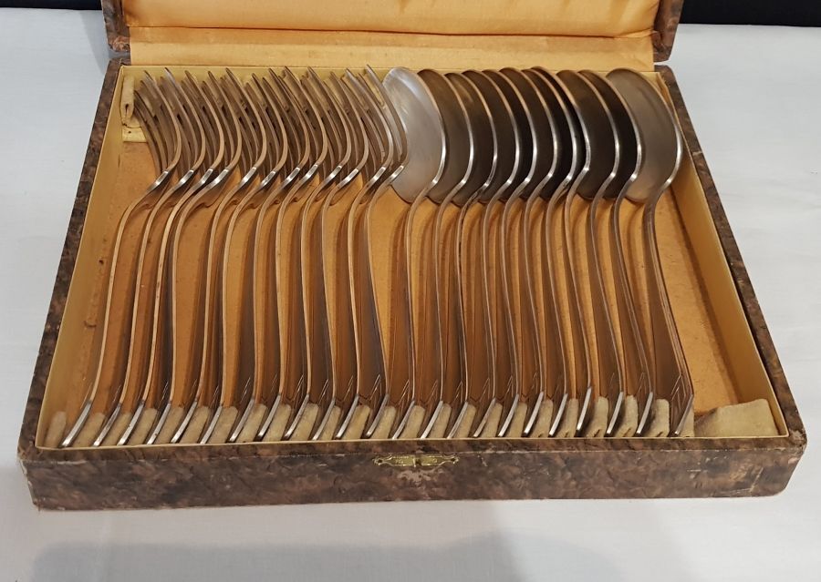 23-piece silver metal art deco cutlery set