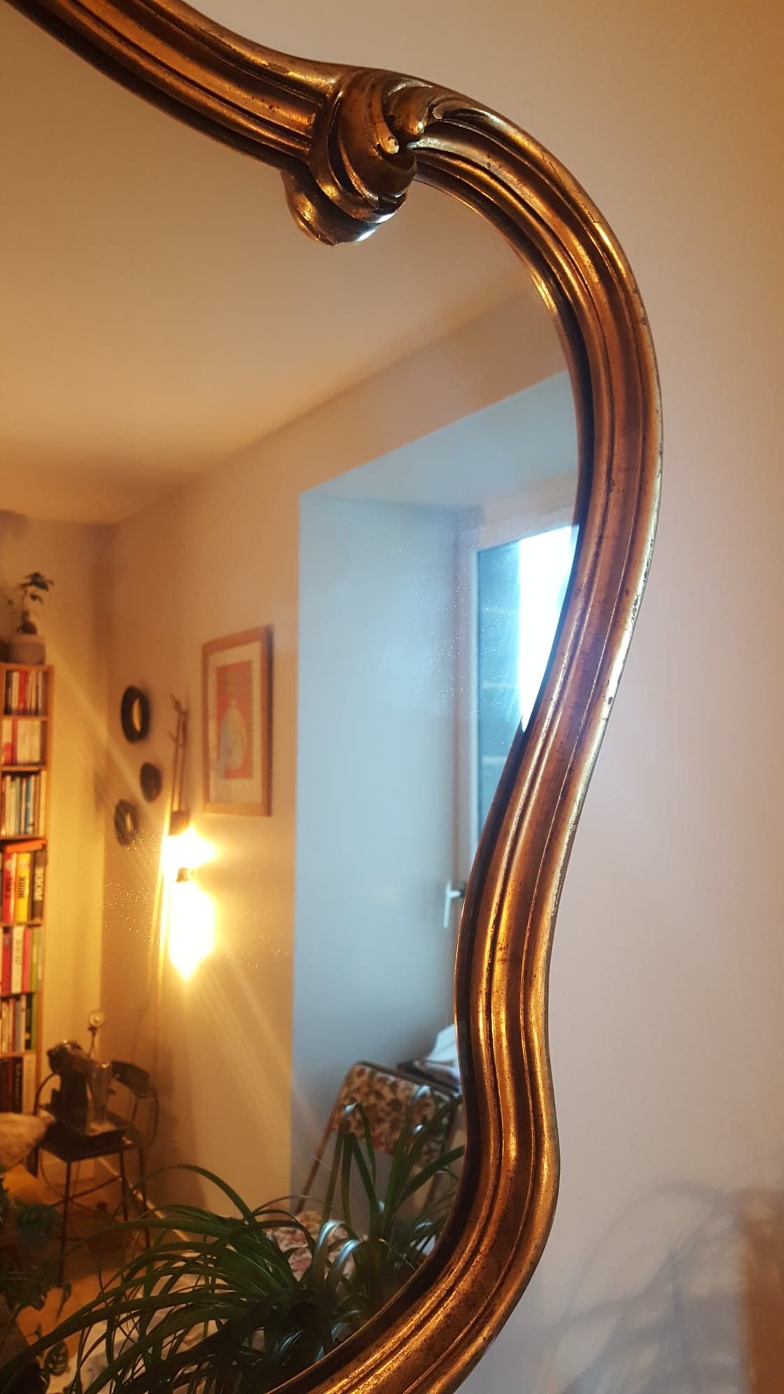 Mirror with golden mouldings