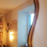 Mirror with golden mouldings