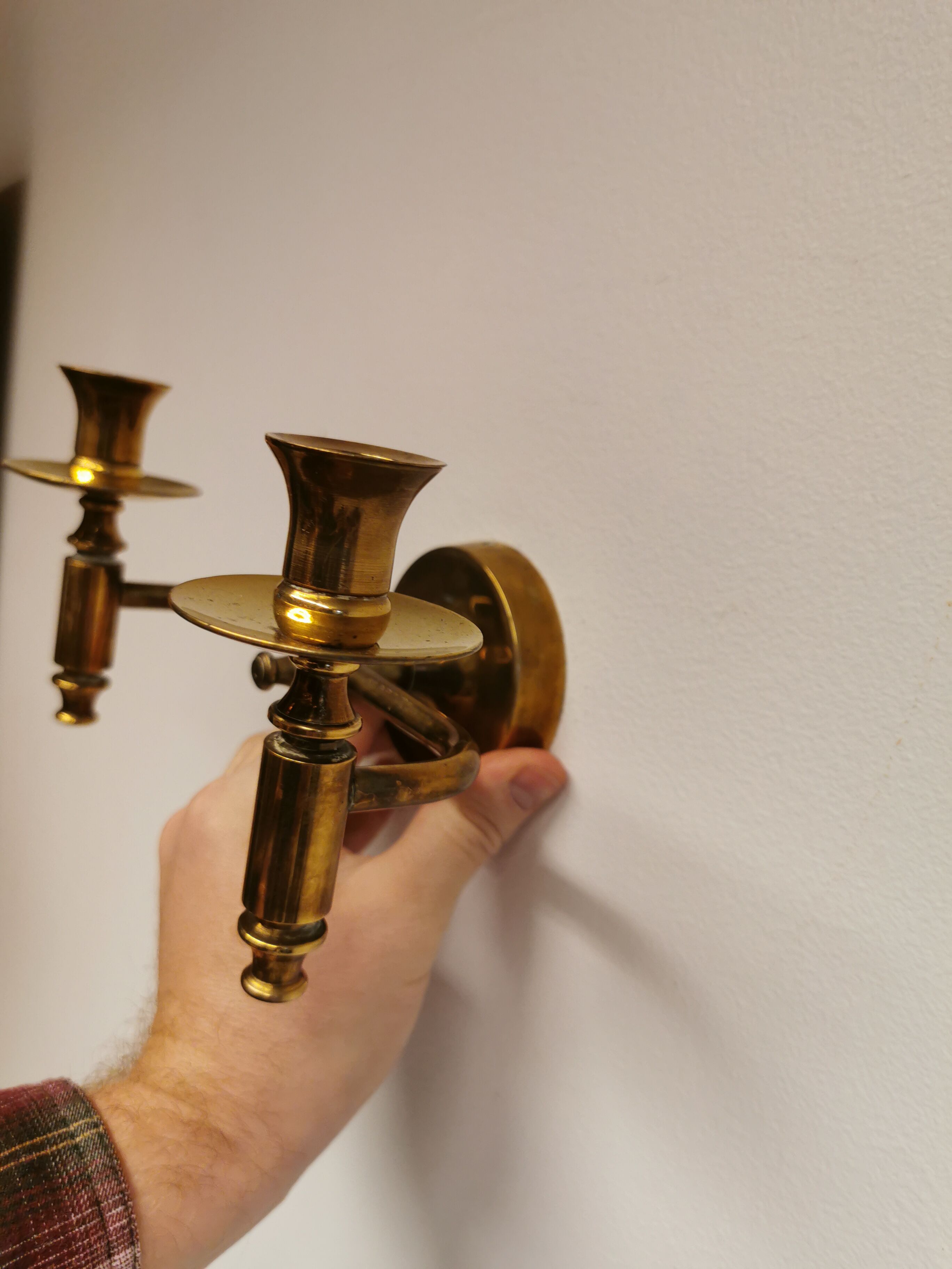 Classic Danish wall hung design candlestick in solid brass