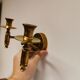 Classic Danish wall hung design candlestick in solid brass