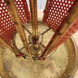 Perforated metal umbrella stand and scoubidou