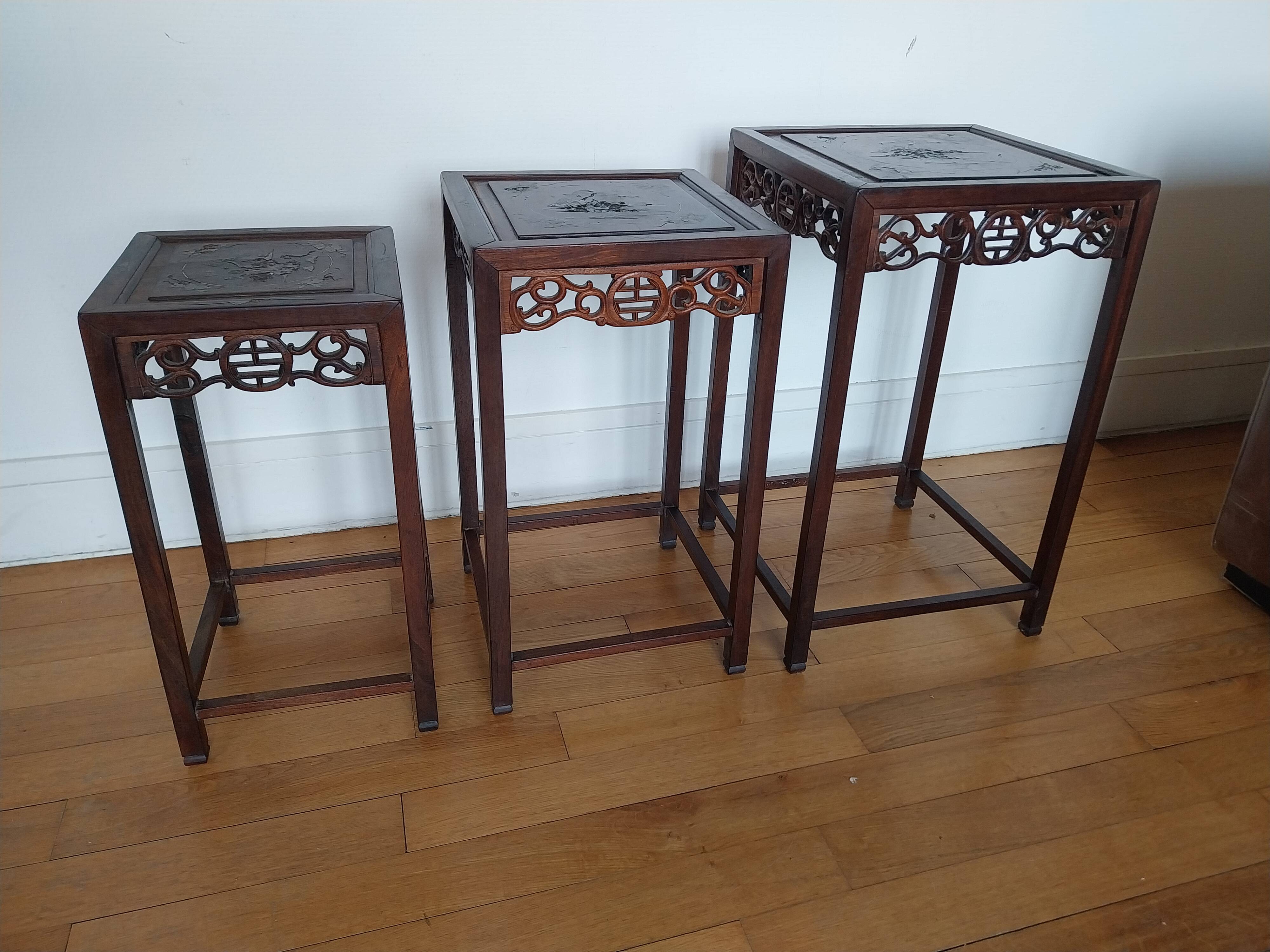 3 Chinese nesting tables in wood and brass.