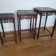 3 Chinese nesting tables in wood and brass.