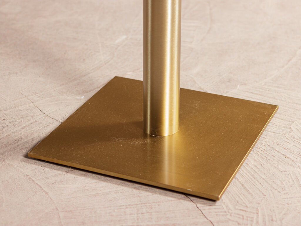 Solid walnut dining table on brass center base