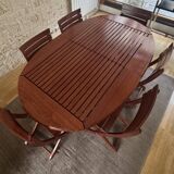Table ovale à rallonge en bois bubinga verni triconfort avec ses 6 chaises