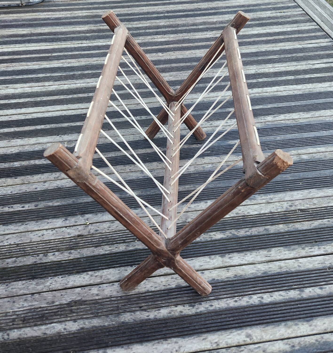 Vintage wooden and wire magazine rack