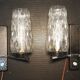 Pair of wall lights from the 1950s-1960s with a push button switch.