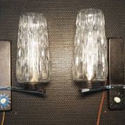 Pair of wall lights from the 1950s-1960s with a push button switch.