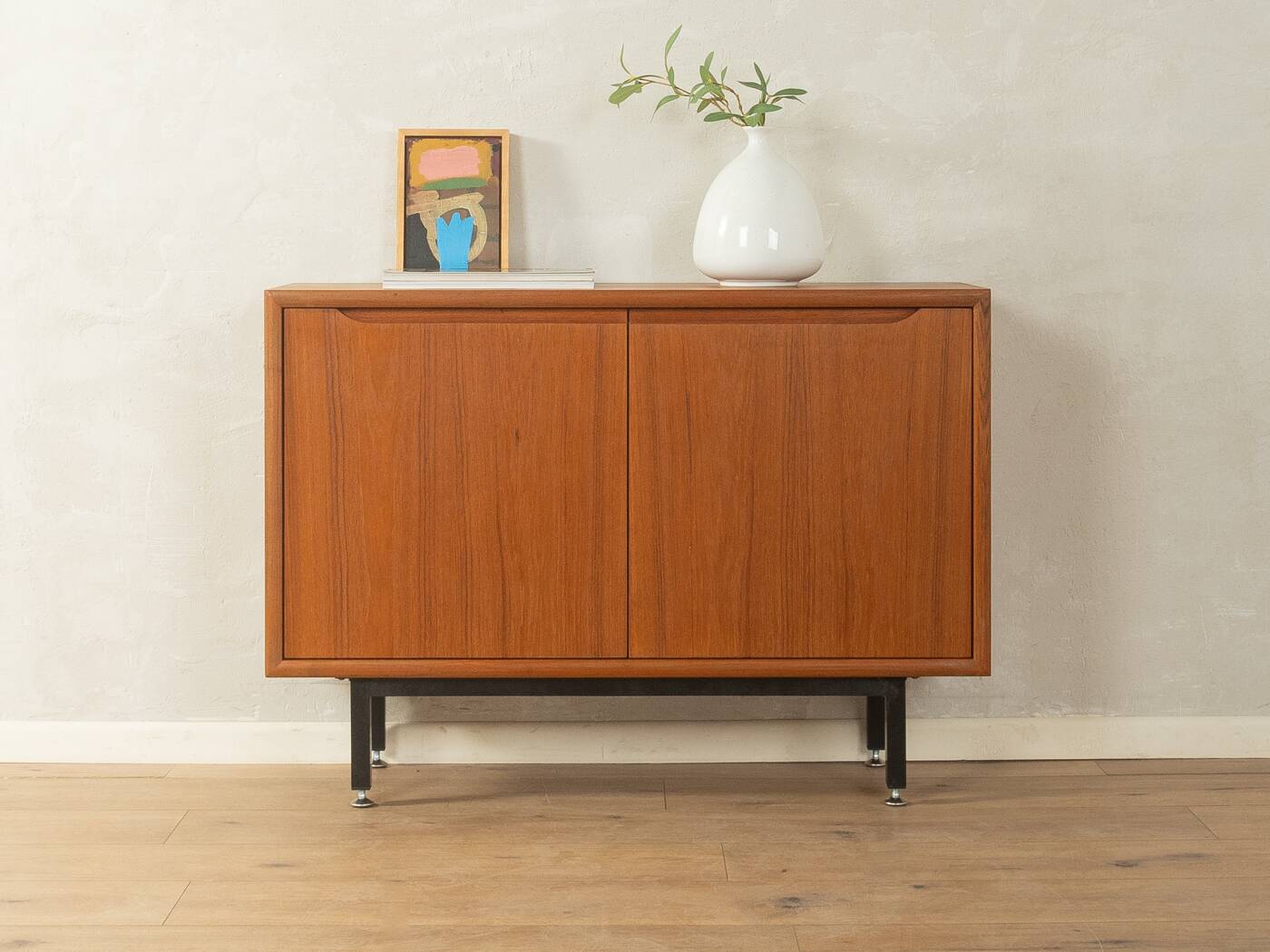 Classic chest of drawers from the 1960s with practical, closed storage space