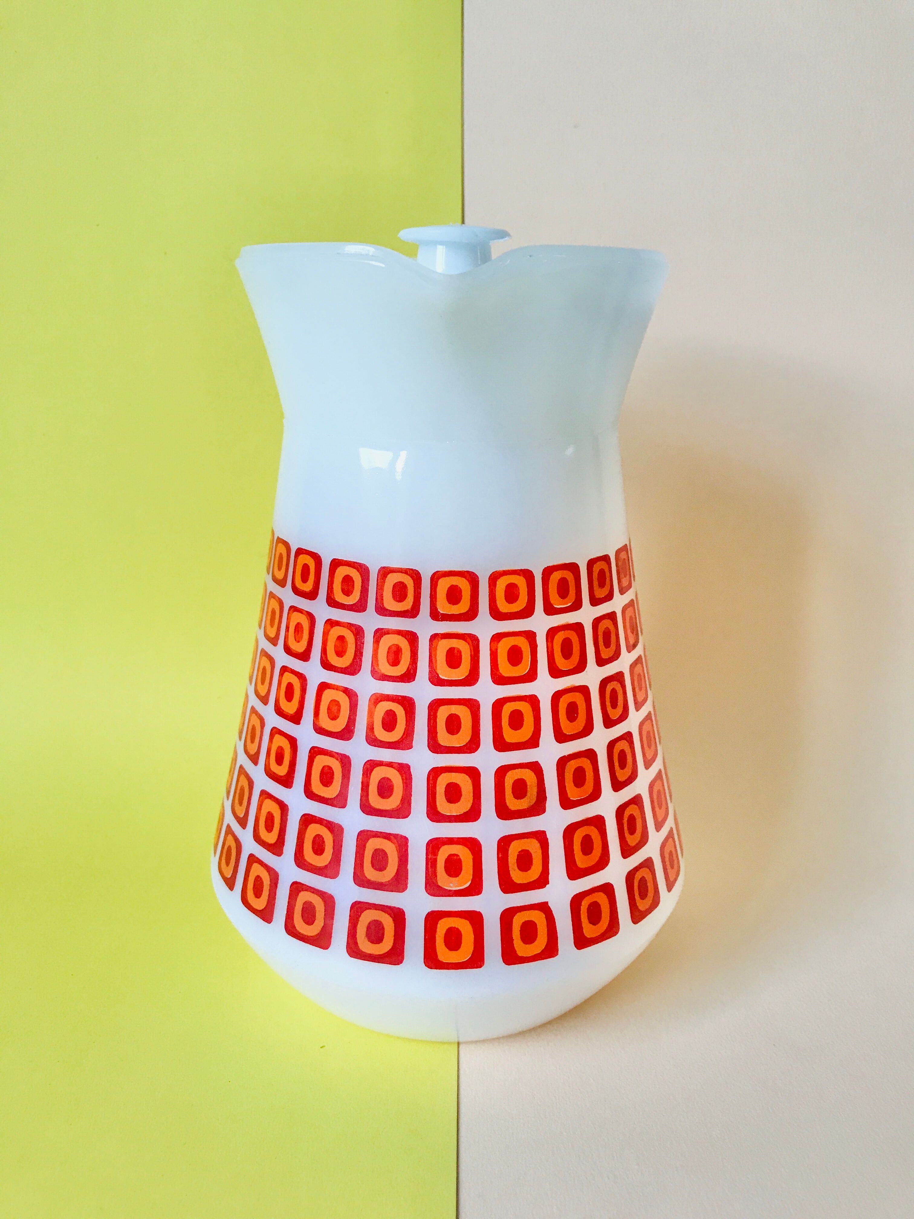 Vintage orange and red 70s arcopal spirit