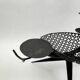 Candlestick sculpture in perforated iron clover motif