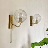 Pair of brass and glass wall sconces