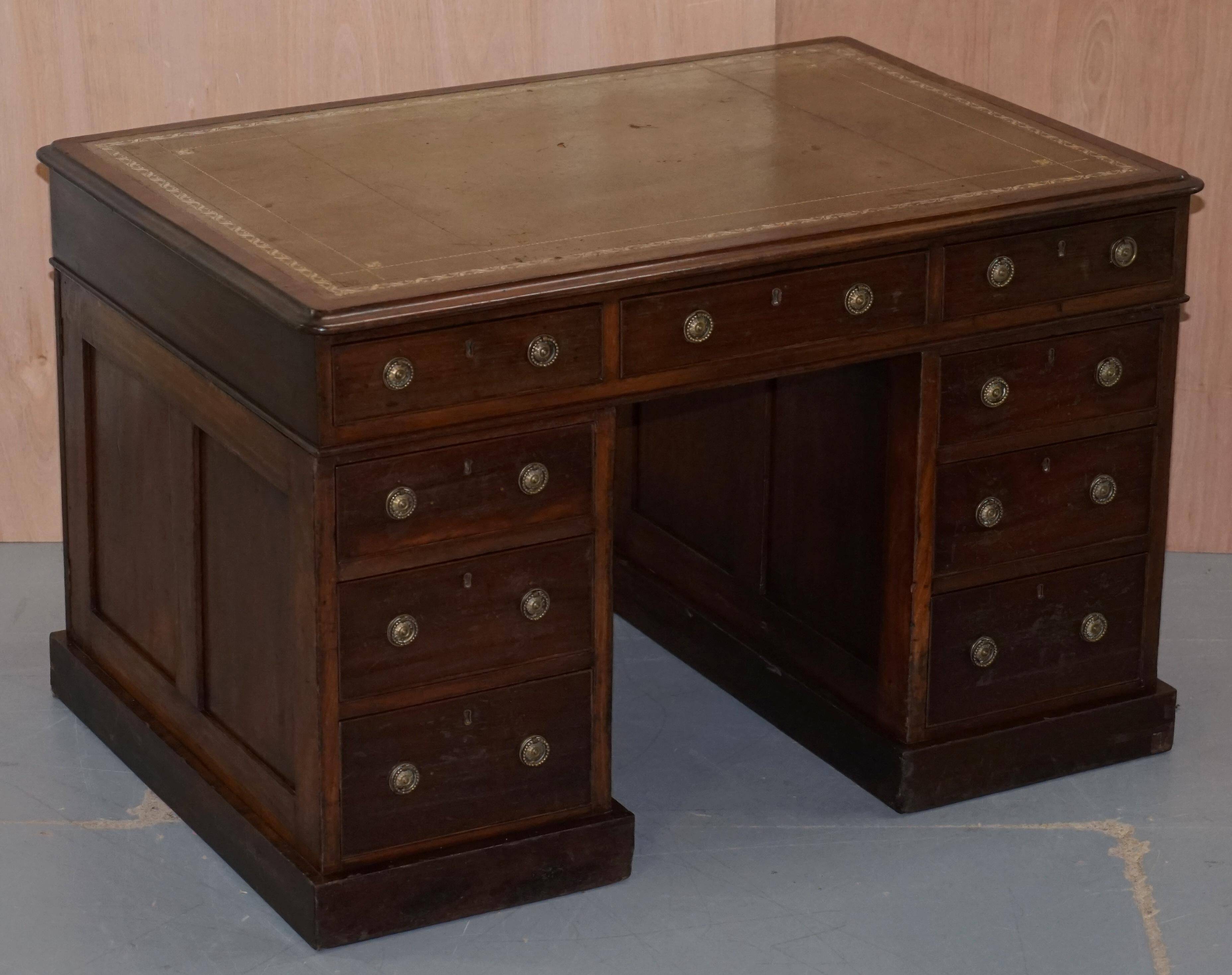 George III double-sided partner's desk in walnut circa 1780 with original handles.
