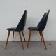 2 chairs in black skai compass legs Louis Paolozzi