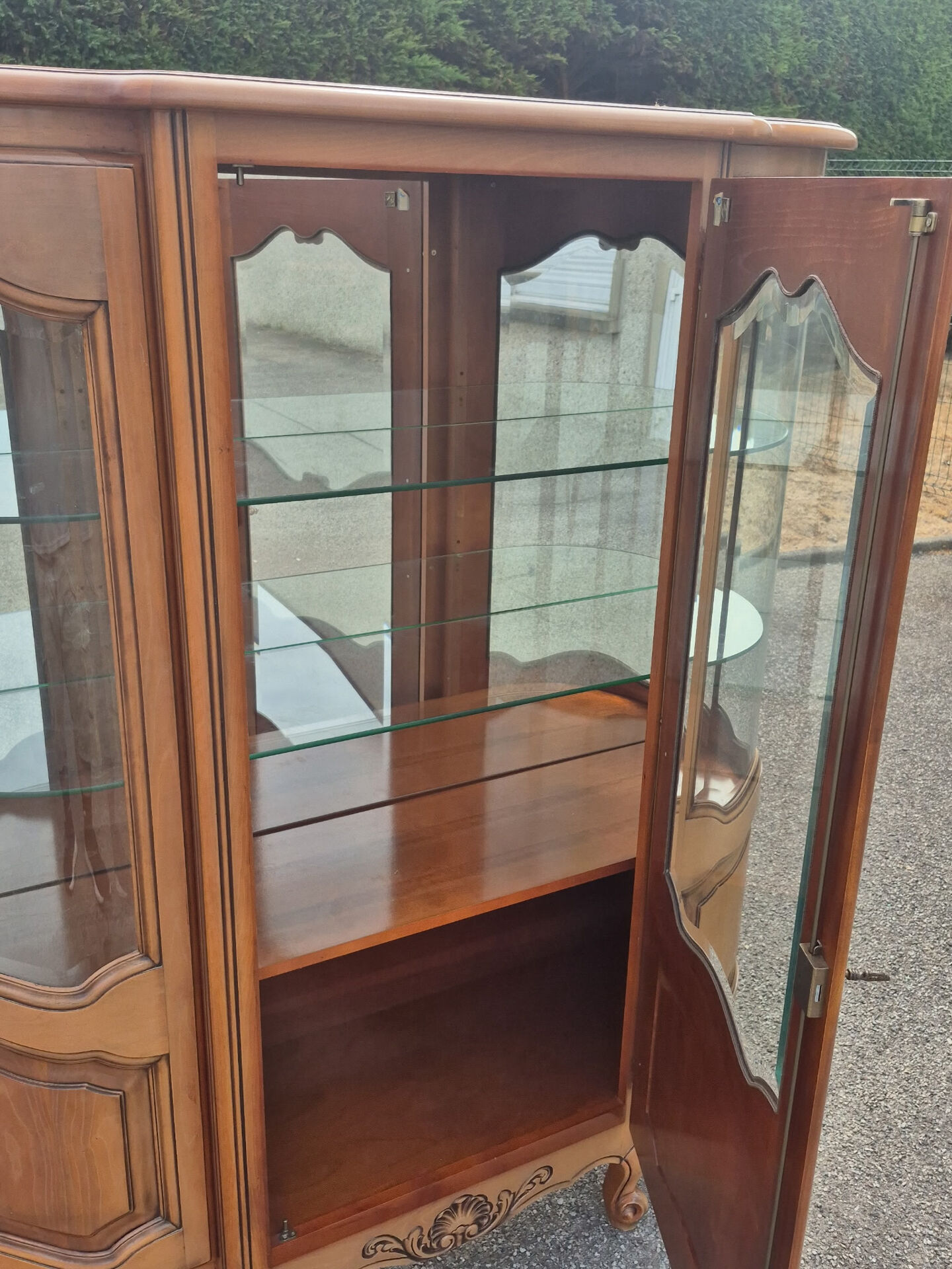 Large curved display cabinet in cherry wood in Louis XV style – 20th century