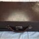 Small old suitcase with a ribbed appearance