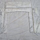 Cheminée Pompadour en marbre blanc de Carrare