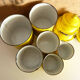 6 spice jars yellow and black enamelled sheet metal, fireplace pot